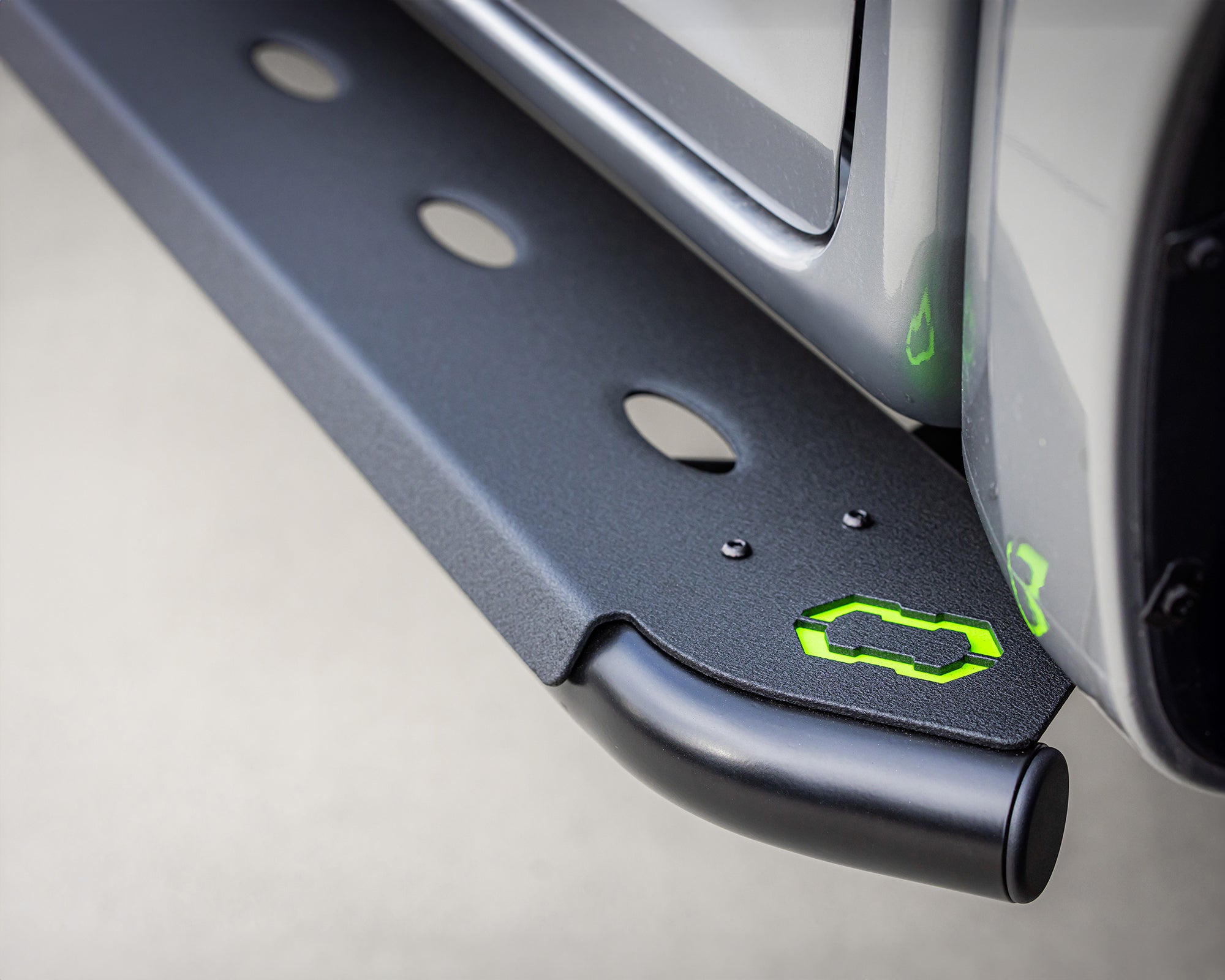 Close up of ironman 4x4 heavy duty steel side steps for byd shark 6 with ironman 4x4 icon