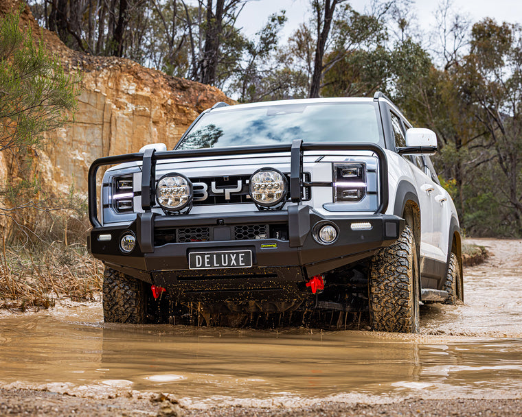 ironman 4x4 aluminium deluxe bull bar for byd shark 6 - driving through muddy puddle