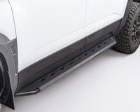 Steel side steps on a white byd shark 6 with a tire visible