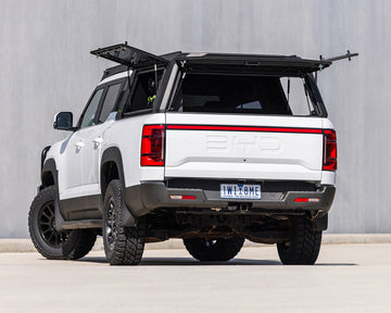 ironman 4x4 raid canopy premium pack with glass panels for byd shark 6 rear 34 view with windows open