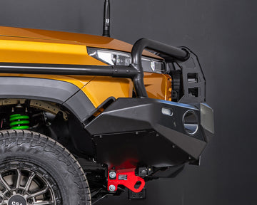 toyota hilux n90 2026 sunglow orange with ironman 4x4 deluxe bull bar side profile